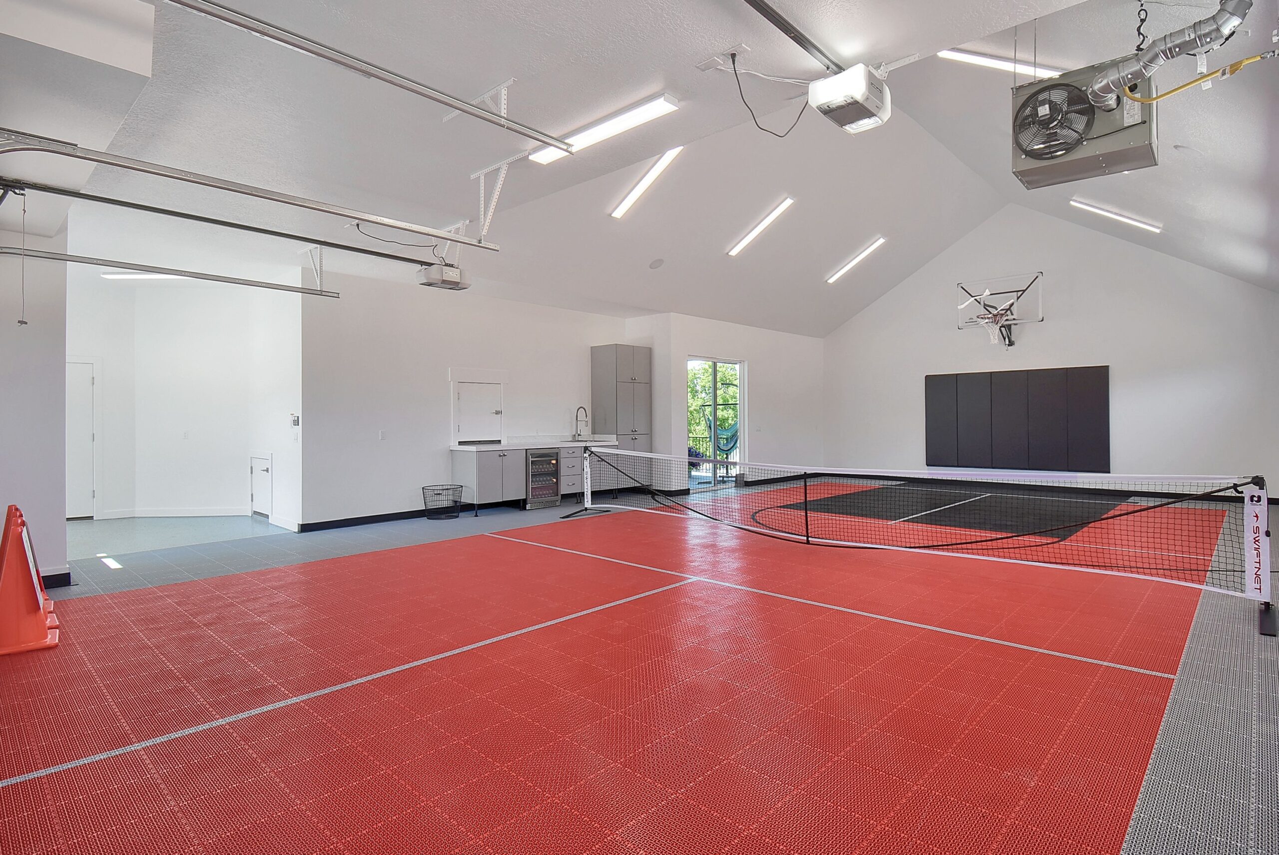 garage court with red and grey tiles